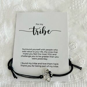 Tribe bracelet. Silver heart with infinity symbol.